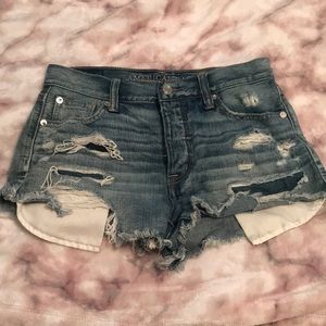 Ripped light wash shorts